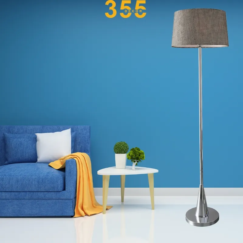 Đèn Đứng DD794 1 Mẫu đèn đứng hiện đại này có thân và đế inox cao cấp sáng bóng, chao đèn nhựa bọc vải màu nâu trầm có thể tháo rời